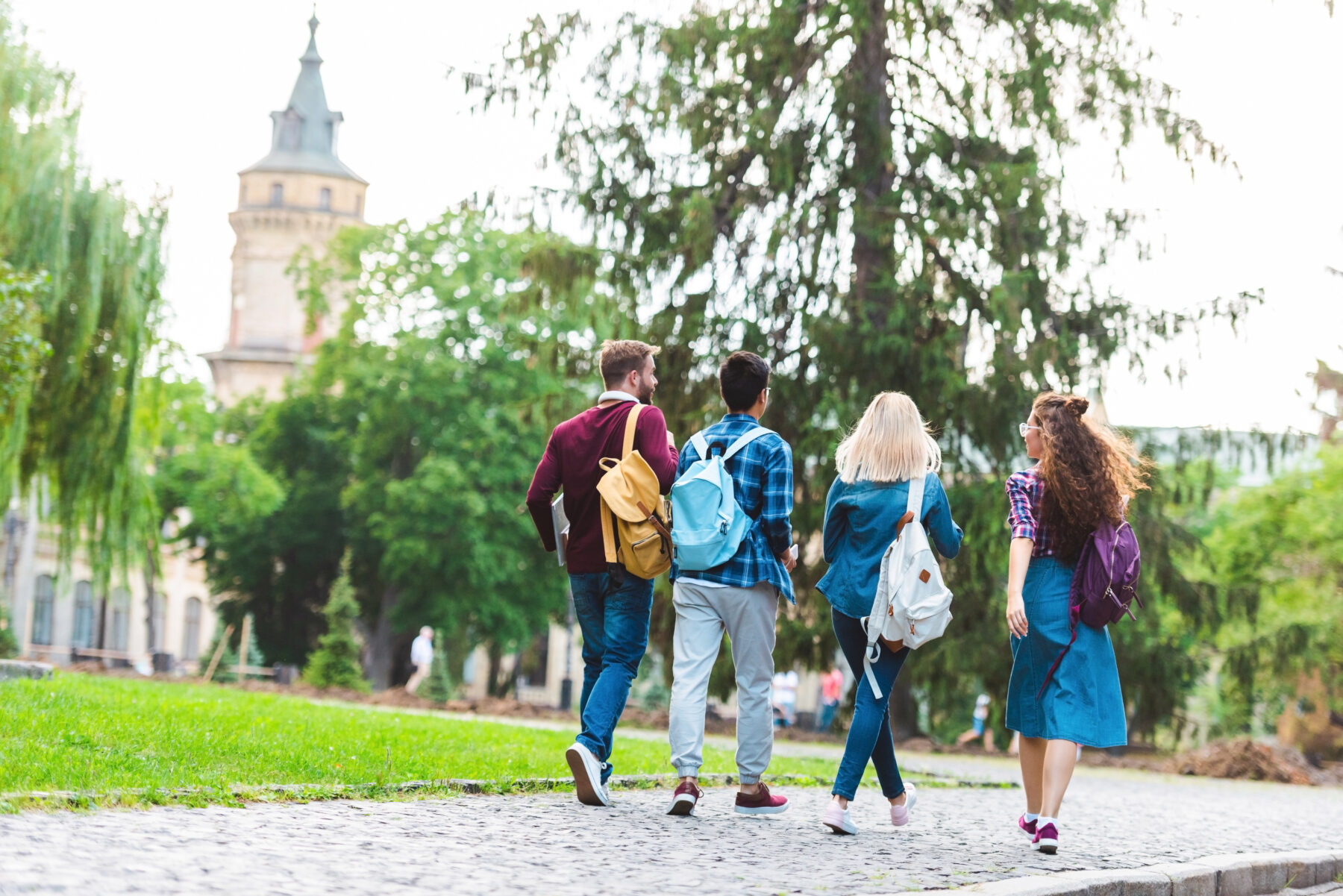 students walking outside at a university